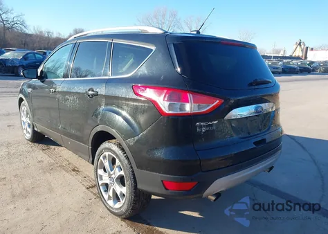 2015 Ford Escape Titanium z USA, uszkodzony, nr VIN 1FMCU0J90FUA20356